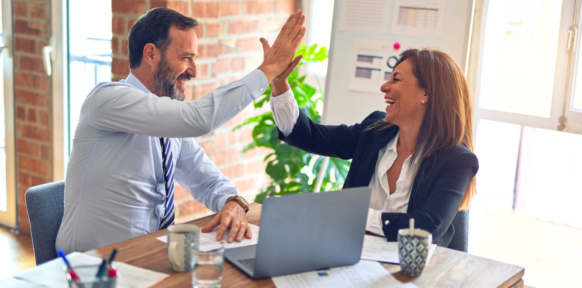 High Five zwischen Geschäftspartnern